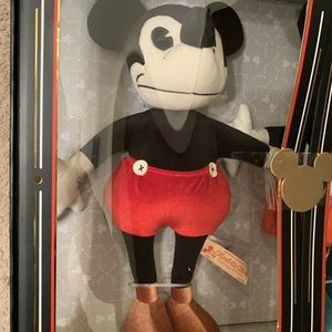 limited release mickey and minnie plush dolls